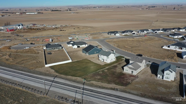 birds eye view of property featuring a rural view