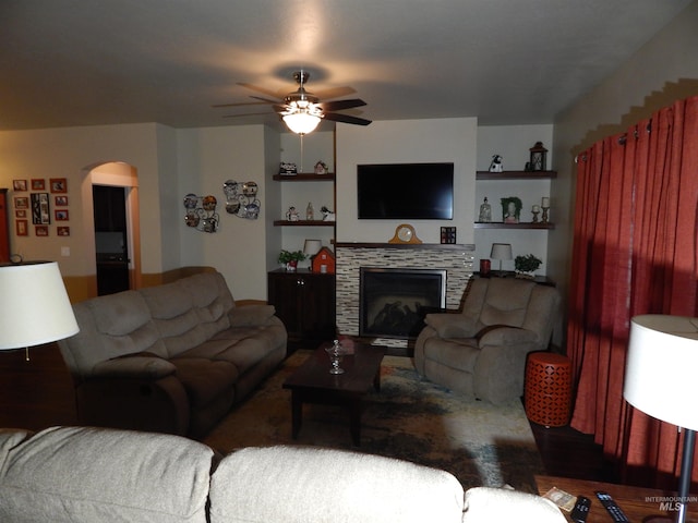 living room featuring ceiling fan