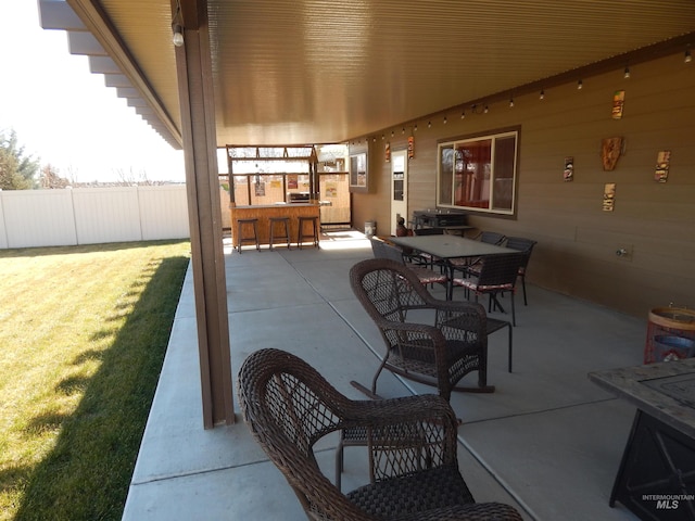 view of patio / terrace with exterior bar