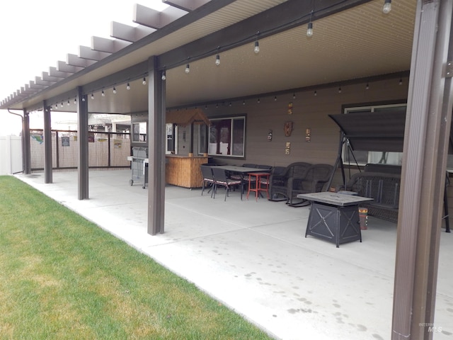 view of patio / terrace with an outdoor bar