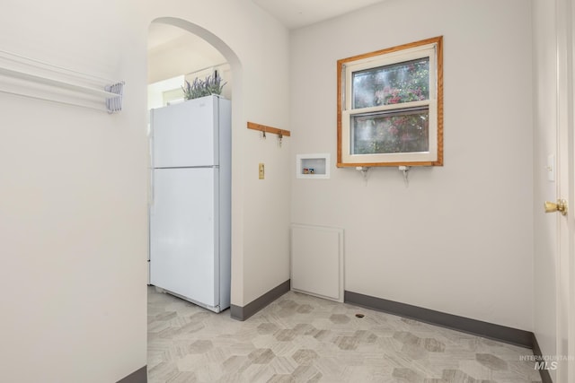4224 W Clinton St, Boise, ID 83706 - laundry area featuring arched walkways and baseboards