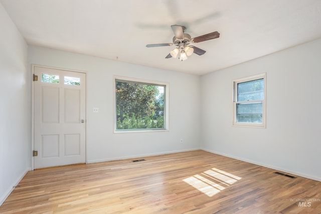4224 W Clinton St, Boise, ID 83706 - unfurnished room with light wood finished floors, ceiling fan, and baseboards