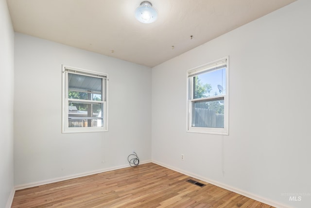 4224 W Clinton St, Boise, ID 83706 - empty room with light wood-style flooring and baseboards