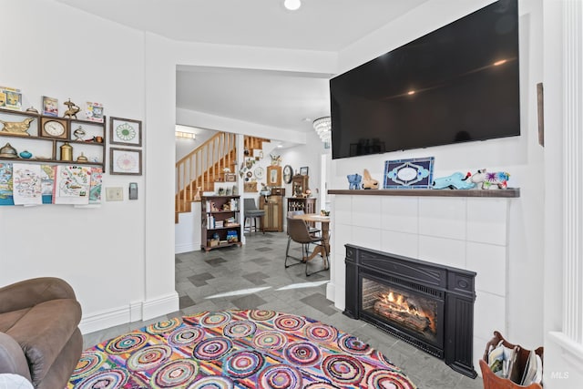 1416 N 13th St, Boise, ID 83702 - living area featuring baseboards, stairs, and a fireplace
