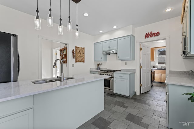 1416 N 13th St, Boise, ID 83702 - kitchen with a sink, appliances with stainless steel finishes, light stone countertops, and under cabinet range hood