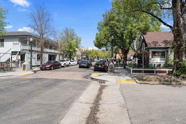1416 N 13th St, Boise, ID 83702 - view of road with sidewalks, curbs, and street lights