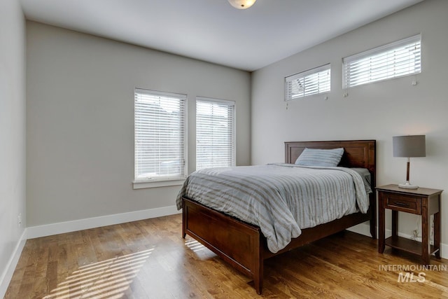 bedroom featuring light wood-type flooring