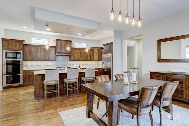 dining area featuring light hardwood / wood-style flooring