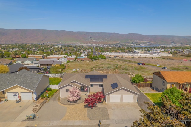 1635 25th Ave, Lewiston, ID 83501 - aerial view of residential area with a mountain backdrop