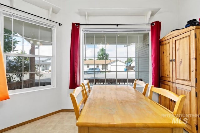 dining room with plenty of natural light