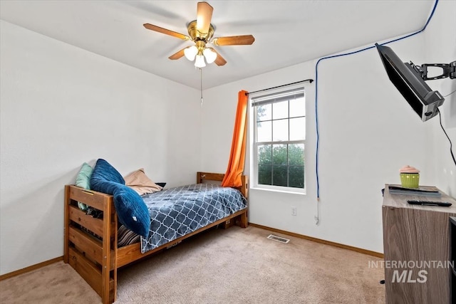 bedroom with carpet flooring and ceiling fan