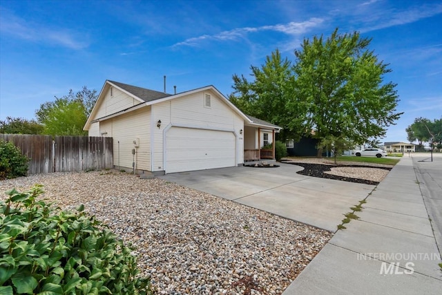 view of property exterior featuring a garage