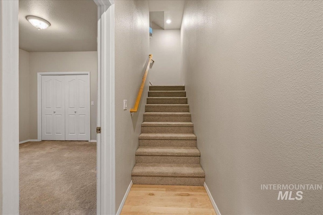 staircase with baseboards
