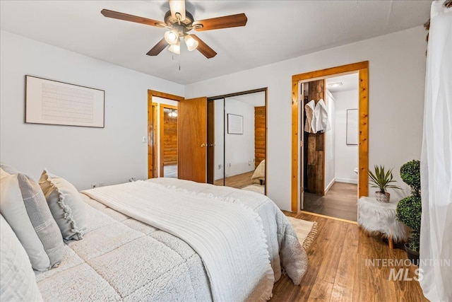 9 Elderberry Cir, Idaho City, ID 83631 - bedroom featuring wood finished floors and a ceiling fan