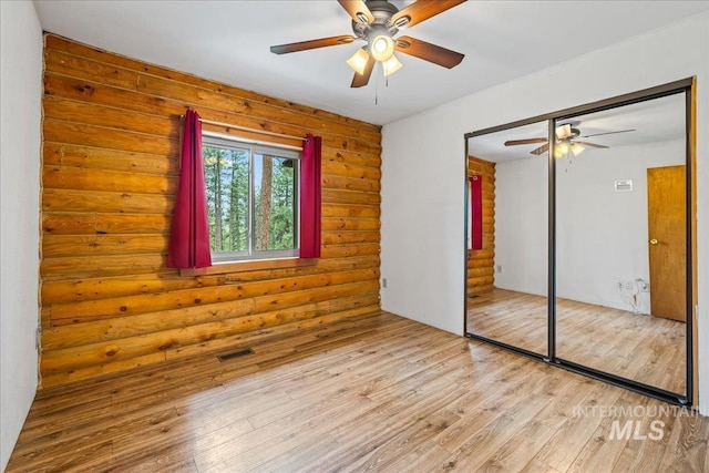9 Elderberry Cir, Idaho City, ID 83631 - unfurnished bedroom featuring wood finished floors, a closet, and a ceiling fan
