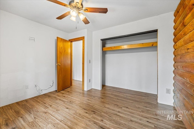 9 Elderberry Cir, Idaho City, ID 83631 - unfurnished bedroom with wood finished floors, ceiling fan, and a closet