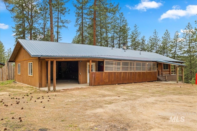 9 Elderberry Cir, Idaho City, ID 83631 - back of property with metal roof