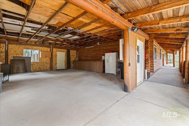 9 Elderberry Cir, Idaho City, ID 83631 - misc room featuring plenty of natural light, a garage, and unfinished concrete floors