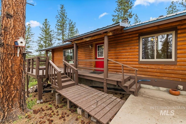 9 Elderberry Cir, Idaho City, ID 83631 - view of front of home with metal roof and faux log siding