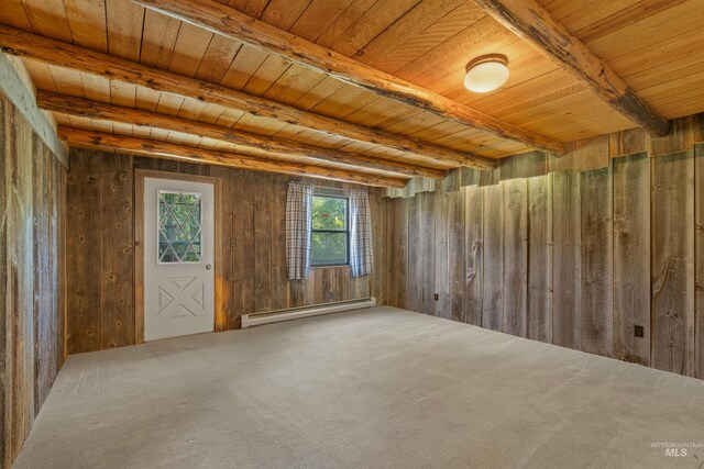 stairway with wooden ceiling, carpet floors, and vaulted ceiling with beams