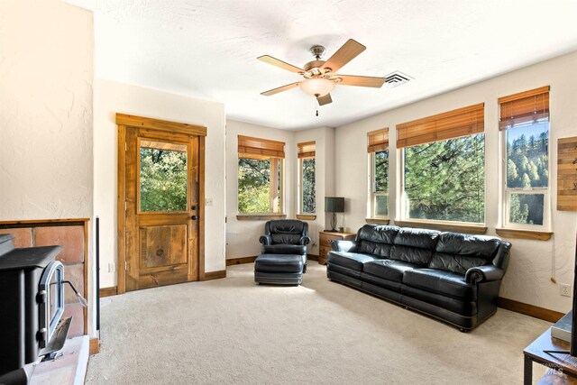 kitchen with black appliances, light hardwood / wood-style floors, and sink