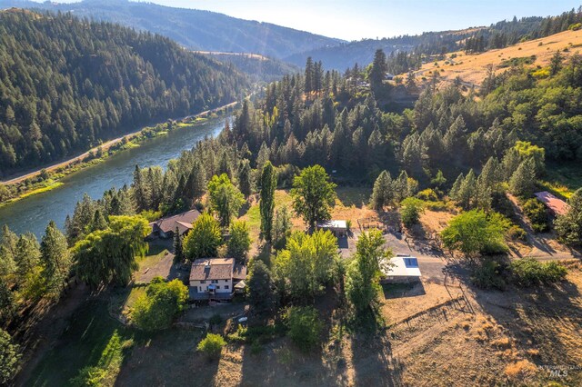 bird's eye view with a water and mountain view