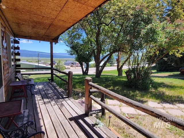 607/611 S Main St, Cascade, ID 83611 - wooden deck with a lawn