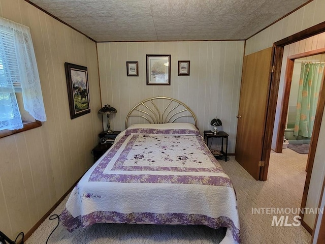 607/611 S Main St, Cascade, ID 83611 - bedroom featuring carpet and wood walls
