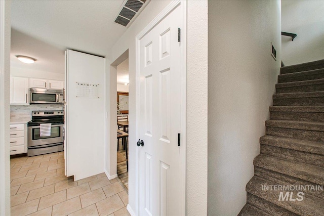 3017 S Windstream Ln, Boise, ID 83706 - staircase with tile patterned flooring