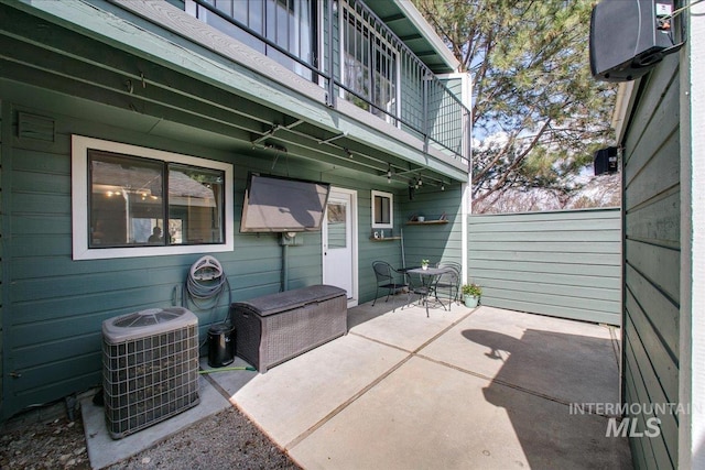 3017 S Windstream Ln, Boise, ID 83706 - view of patio featuring central air condition unit and a balcony