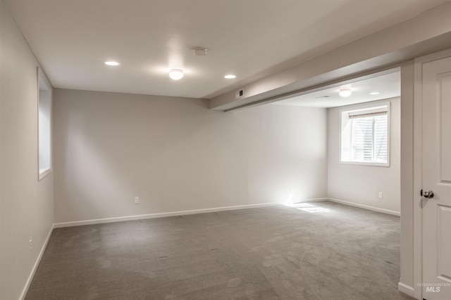 carpeted spare room with recessed lighting and baseboards