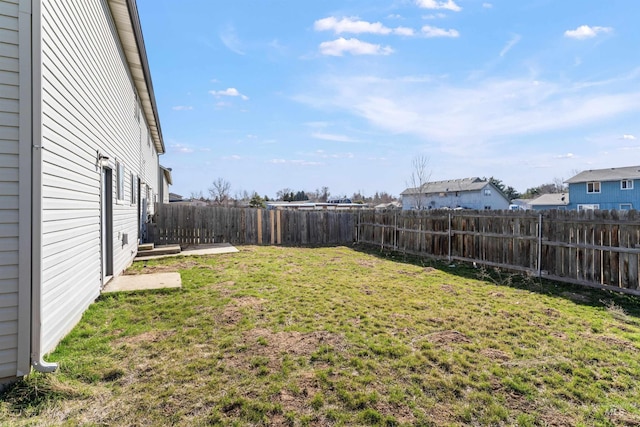 view of yard featuring a fenced backyard