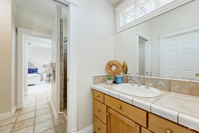 3586 N Croft Way, Eagle, ID 83616 - bathroom featuring vanity, tile patterned flooring, and baseboards