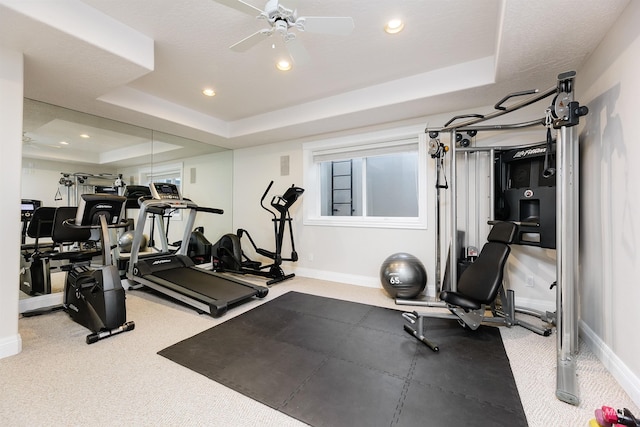 3586 N Croft Way, Eagle, ID 83616 - exercise area featuring a tray ceiling, a ceiling fan, baseboards, and recessed lighting