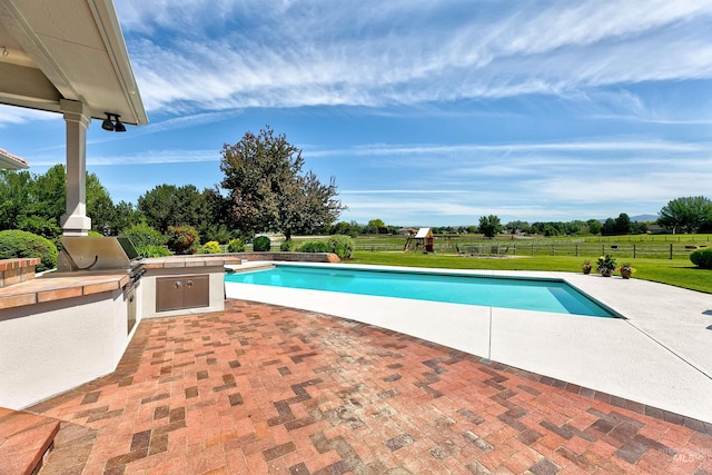 3586 N Croft Way, Eagle, ID 83616 - view of swimming pool featuring a patio area and a rural view