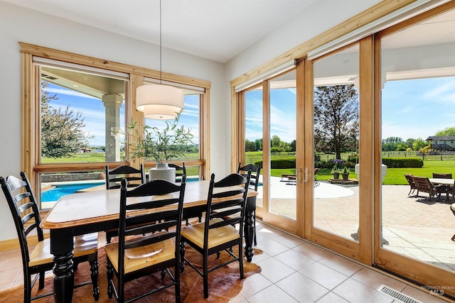3586 N Croft Way, Eagle, ID 83616 - dining room with plenty of natural light, light tile patterned floors, and french doors