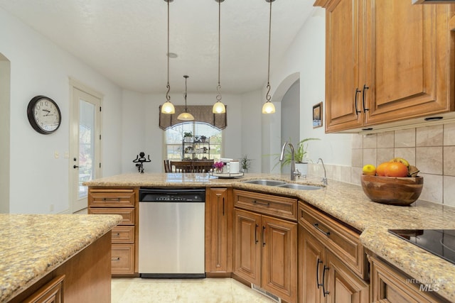 kitchen featuring dishwasher, arched walkways, a sink, decorative backsplash, and light stone counters