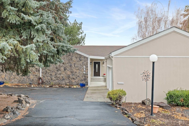 view of front of house featuring stone siding