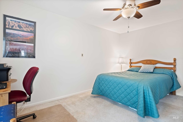 bedroom with carpet floors, a ceiling fan, and baseboards