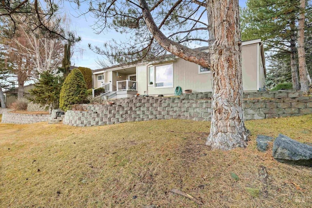 view of front of property with a front lawn