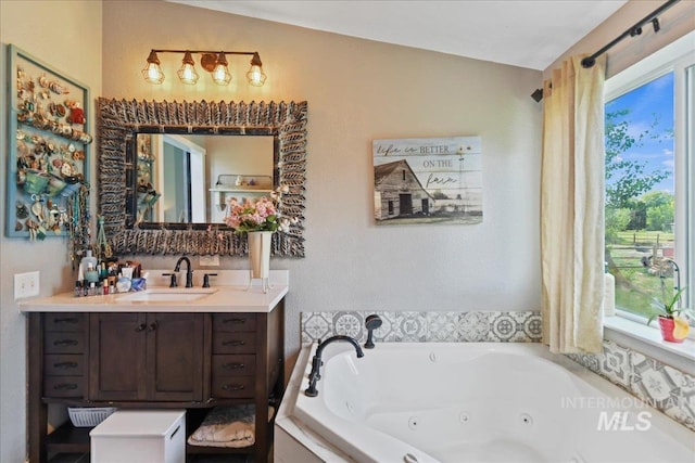 22969 Bumble Bee, Middleton, ID 83644 - bathroom with a jetted tub and vanity