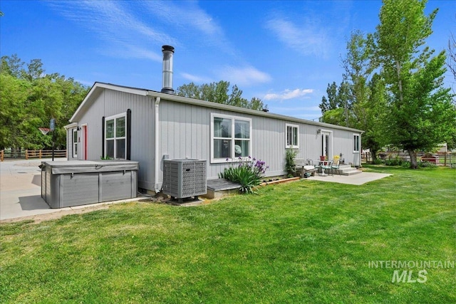 22969 Bumble Bee, Middleton, ID 83644 - back of house featuring a hot tub, central air condition unit, a patio, and entry steps