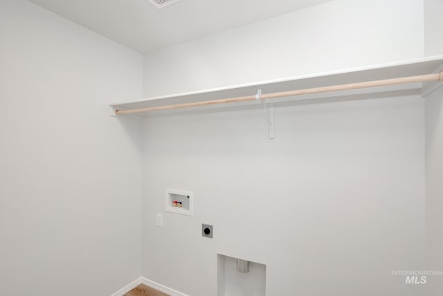 laundry room with hookup for a washing machine and hookup for an electric dryer