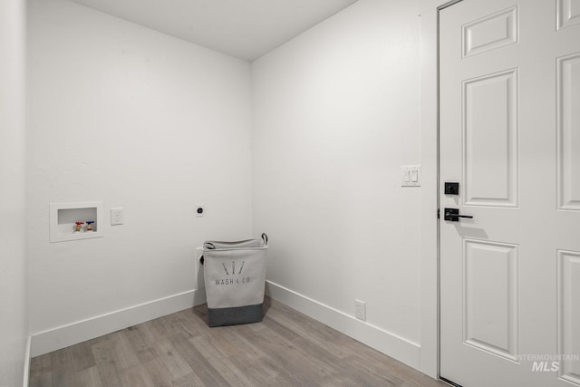 laundry area with baseboards, laundry area, hookup for a washing machine, light wood-style flooring, and electric dryer hookup