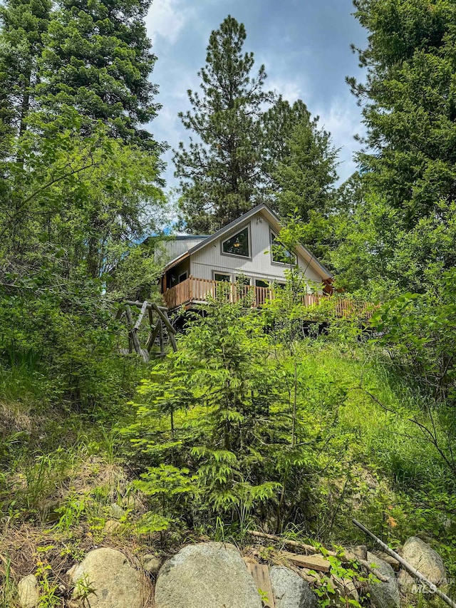 view of property exterior featuring a balcony