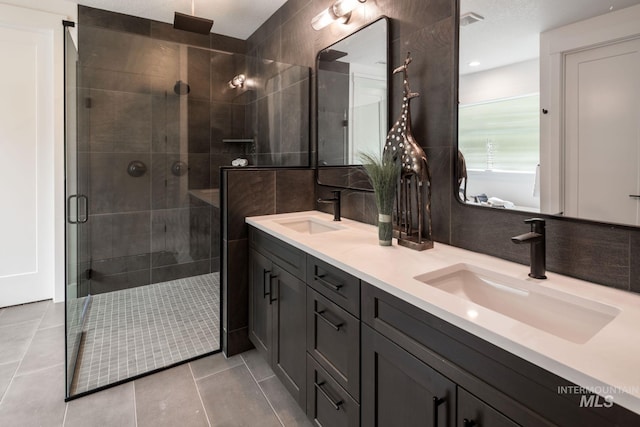 7755 W Flathead Lake St, Eagle, ID 83616 - full bath featuring a shower stall, double vanity, and tile patterned flooring