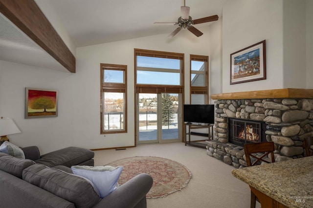 732 Morning Star Rd, Sun Valley, ID 83353 - carpeted living area with a ceiling fan, visible vents, high vaulted ceiling, beam ceiling, and a stone fireplace
