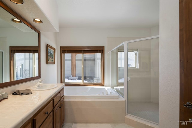 732 Morning Star Rd, Sun Valley, ID 83353 - bathroom featuring a wealth of natural light, a garden tub, and a stall shower