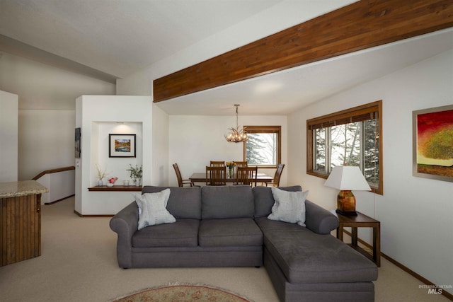 732 Morning Star Rd, Sun Valley, ID 83353 - living room featuring baseboards, carpet floors, beam ceiling, and a chandelier