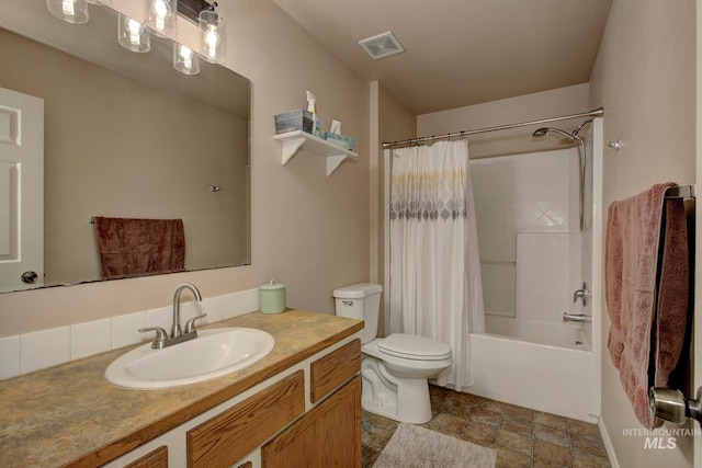 full bathroom with vanity, toilet, and shower / bathtub combination with curtain